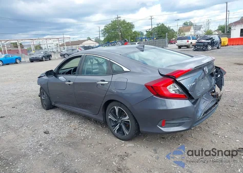 2016 Honda Civic Touring from USA, damaged, VIN 2HGFC1F9XGH631536